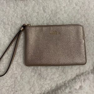 gold coach wristlet